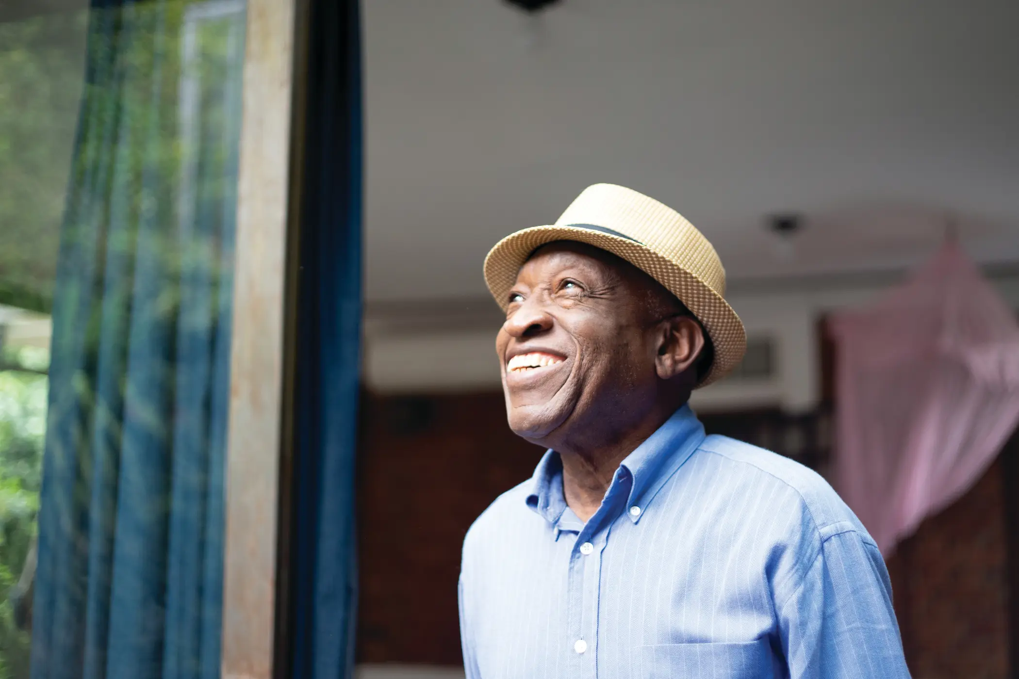 Elderly gentleman smiling broadly